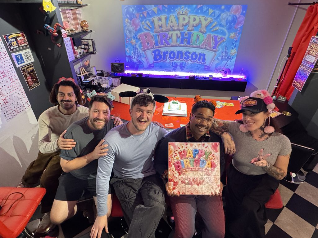 International family enjoying Bronson's birthday surprise at MagicBar ELEVEN in Osaka